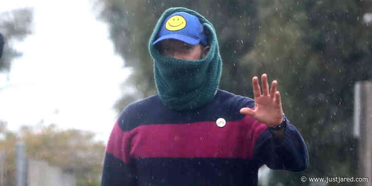 Chris Martin Covers Up in a Scarf While on a Stroll With a Friend Amid Pandemic