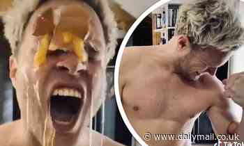 Olly Murs gets egg smashed on his FACE by girlfriend Amelia Tank