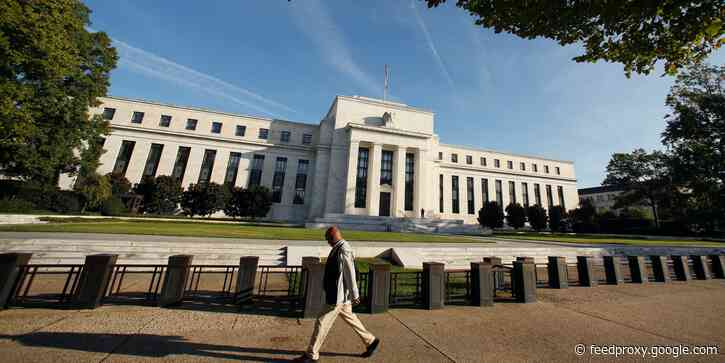 The Fed estimated a 'more adverse' coronavirus outbreak would plunge the US into a year-long recession, meeting minutes reveal