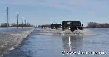 Gov. Tim Walz activates Minnesota National Guard to combat flooding threat
