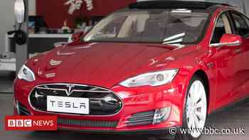 Tesla cuts staff pay as coronavirus halts production