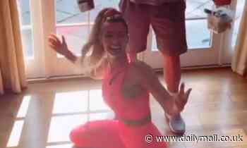 Christine McGuinness displays her figure in hot pink gym gear as she films another TikTok video