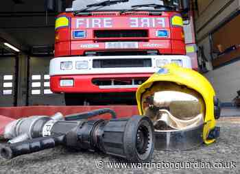 Garden fire spreads to garage in Winwick