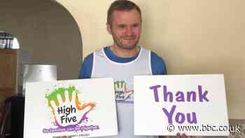 Bolton Wanderers press officer runs marathon in living room for charity - BBC Sport