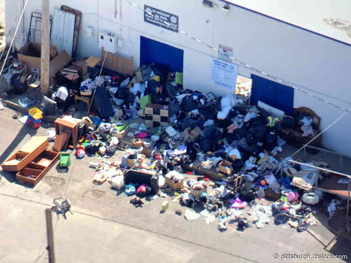 Volunteers To Help Clean Up Mess Of Donations Outside St. Vincent DePaul Building