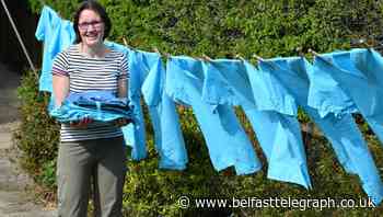 Army of sewers stitching scrubs at home appeal for cash for fabric
