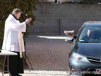 Eerie photos show quiet Easter and Passover celebrations amidst the COVID-19 outbreak: Drive-thru sermons, virtual Seders, and a lone pope