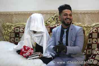Iraqi couple enlist help of police to wed despite curfew - St Helens Star