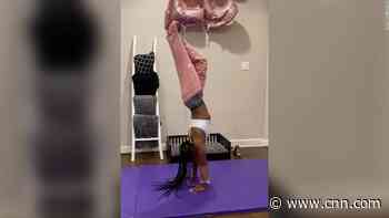 Good luck topping this one. Biles takes handstand challenge to next level