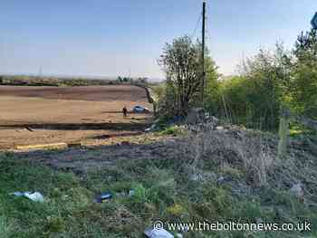 Car found in field after rolling several times in Farnworth