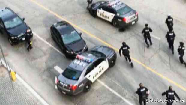 Police cruiser runs over suspect during chase through downtown Toronto