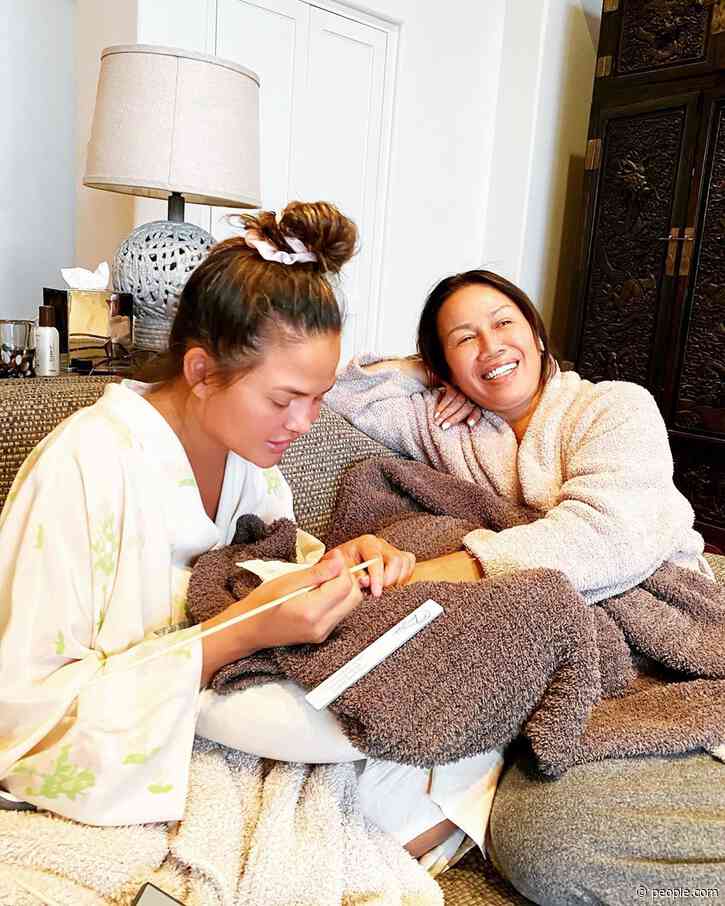 Chrissy Teigen Shares Makeup-Free Photo While Giving Her Mom an At-Home Gel Manicure
