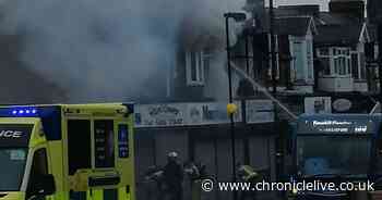 People flee their homes as fire breaks out in flat