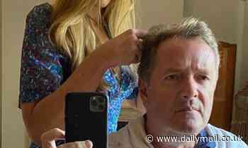 Piers Morgan looks less than impressed as wife Celia Walden gives him a home haircut