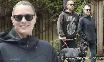 Robin Wright steps out with husband Clement Giraudet and their pup for a family stroll in LA