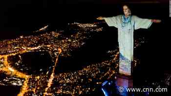 See Rio's Christ the Redeemer statue lit up as a doctor