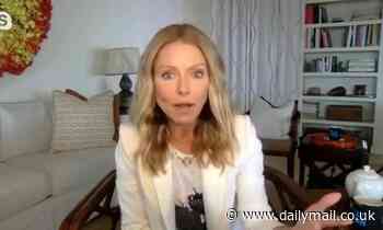 Kelly Ripa, 49, reveals she is covering up her gray roots with color spray