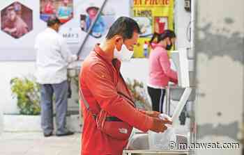 Vietnamese Entrepreneur Develops Rice ATM to Help People amid Pandemic - Asharq Al-awsat English