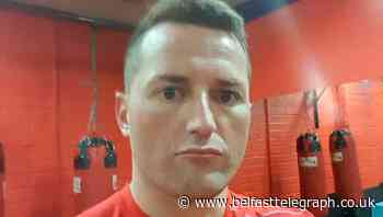 Police search for hooded man after 'brutal' Robbie Lawlor killing