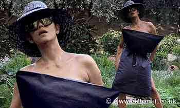 Halle Berry belts a pillow to her bare body as she hops on board the latest social media challenge