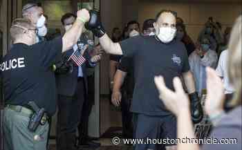 Coronavirus live updates: Houston approves airlines deal, Texas businesses fight to be 'essential' - Houston Chronicle