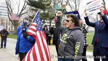 Hundreds protest over Michigan governor’s social distancing order