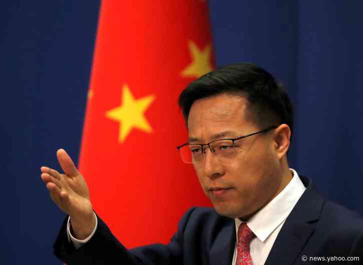 China says WHO has said no evidence coronavirus was made in a lab