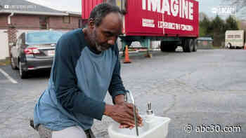 Formerly homeless man installs hand washing stations to help others