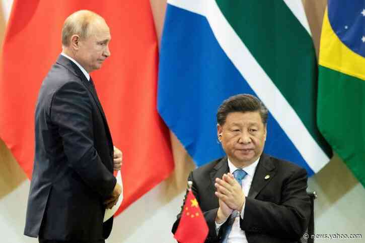 Putin, Xi slam attempts to blame China for late virus response