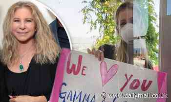 Barbra Streisand shares a sweet picture of her stepdaughter Kathryn holding a 'We love you' sign