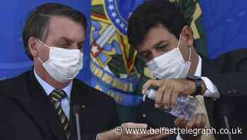Brazilian leader fires health minister after virus dispute