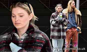 Elsa Hosk bundles up in cozy boyfriend jacket as she and beau Tom Daly step out for a stroll