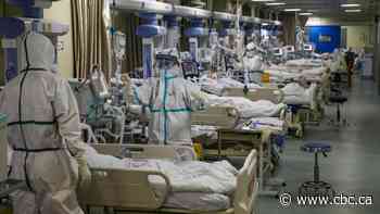 Wuhan health officials raise death toll linked to COVID-19 by 50%
