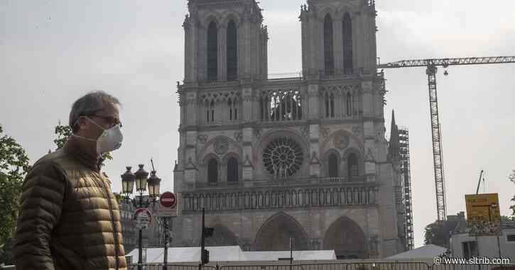 A year after blaze, Notre Dame restoration halted by virus
