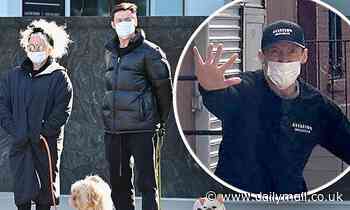 Hugh Jackman seen with Deborra-Lee Furness on dog walk with face masks after fun Ryan Reynolds jab