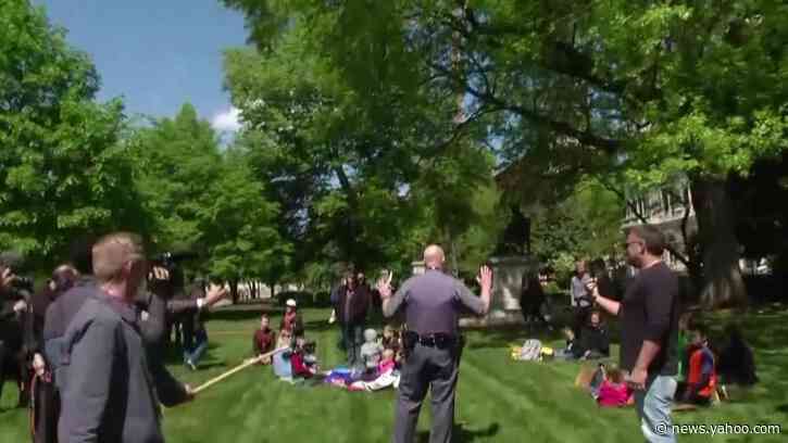 Demonstrators protest stay-at-home orders in Virginia