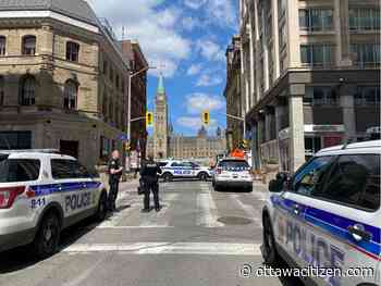 Police declare all-clear on 'suspicious package' near parliament buildings
