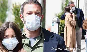 Ben Affleck snuggles his sweetheart Ana de Armas as they wait in line for donuts