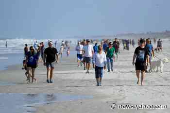 Crowds flock to Jacksonville beaches amid record COVID-19 cases