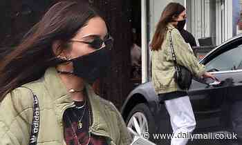 Vanessa Hudgens takes a self-isolation break as she steps out with a mask to run errands in LA