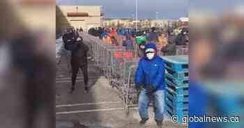 Coronavirus: Calgary doctor leads workout as people wait in line at Costco