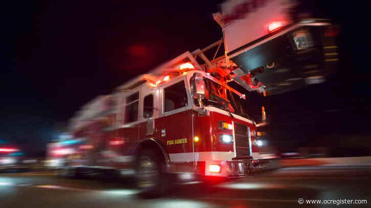 Firefighters rescue woman and her dog from Santa Ana River