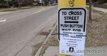 Minneapolis covers up walk buttons to protect pedestrians from coronavirus