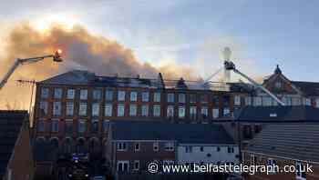 Firefighters tackle blaze at block of flats