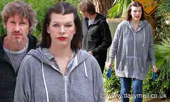 Milla Jovovich and Paul W. S. Anderson walk their dogs in LA... after celebrating Orthodox Easter