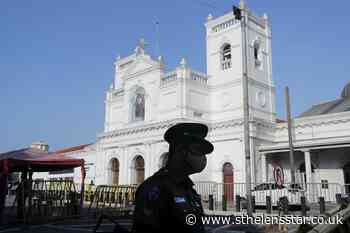 Sri Lankans remember Easter bomb victims at home amid virus - St Helens Star