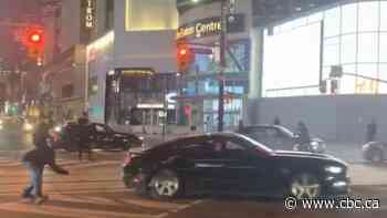 Mustang filmed doing doughnuts at Yonge and Dundas, police now searching for driver