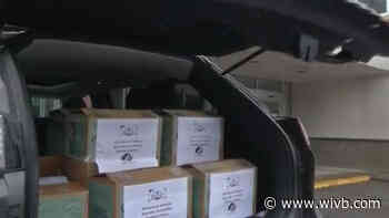 Honor Flight volunteers and Scouts Troop in Alden drop off care packages to vets at Batavia VA Medical Center