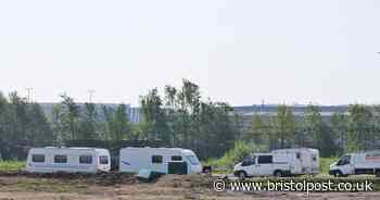 Traveller set up camp near supermarket