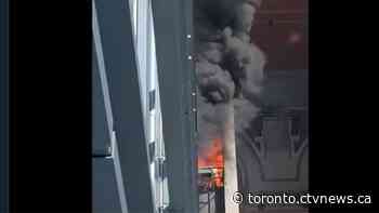 Crews respond to two-alarm fire at downtown highrise